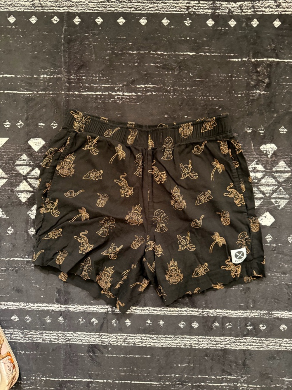Black Shorts with Gold Tropical Print